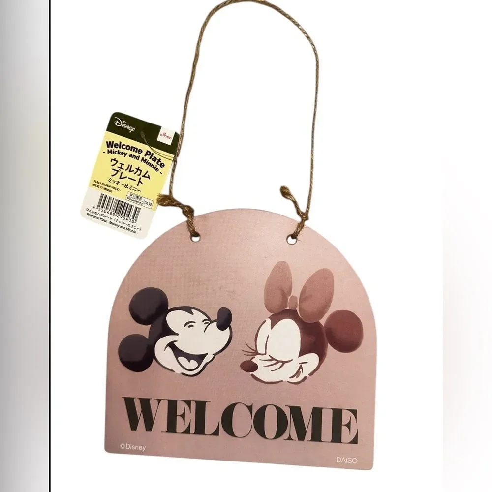 Disney Mickey Mouse Phone Holder and welcome sign.